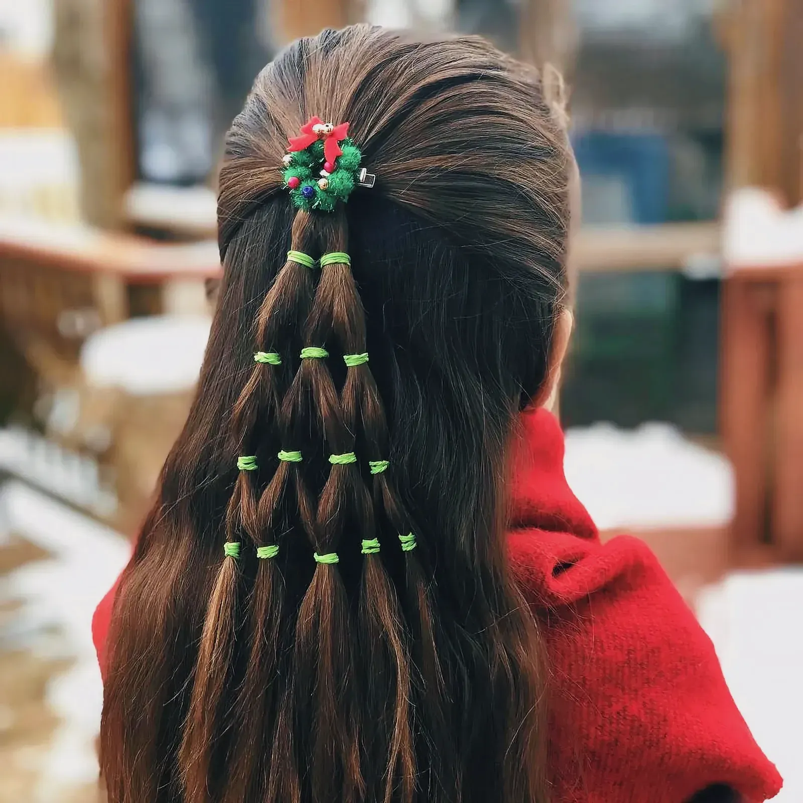 Young girl with a festive Christmas hairstyle