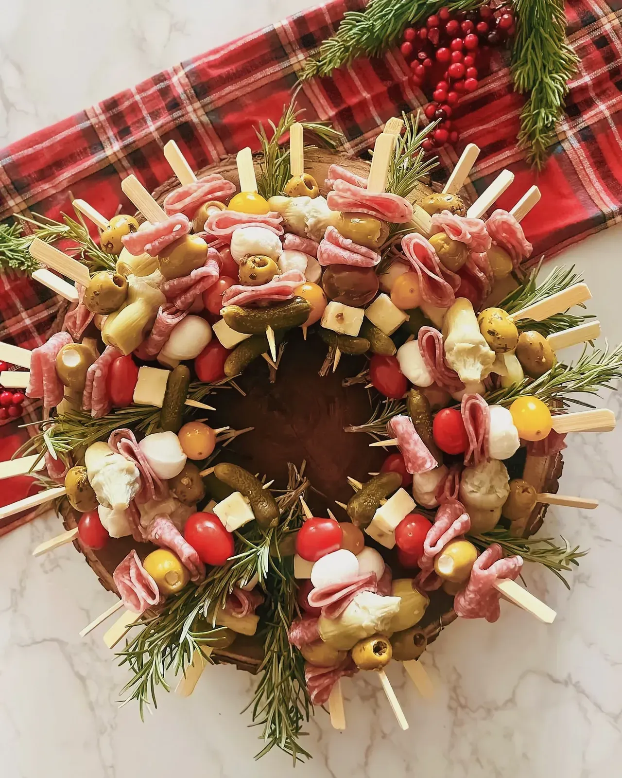 Charcuterie skewer wreath with a variety of ingredients