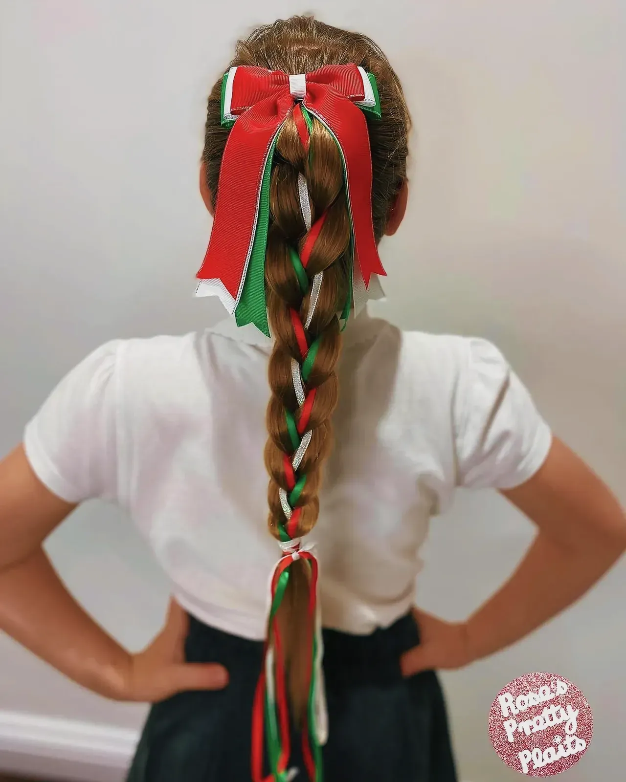 Girl with festive ribbon hairstyle