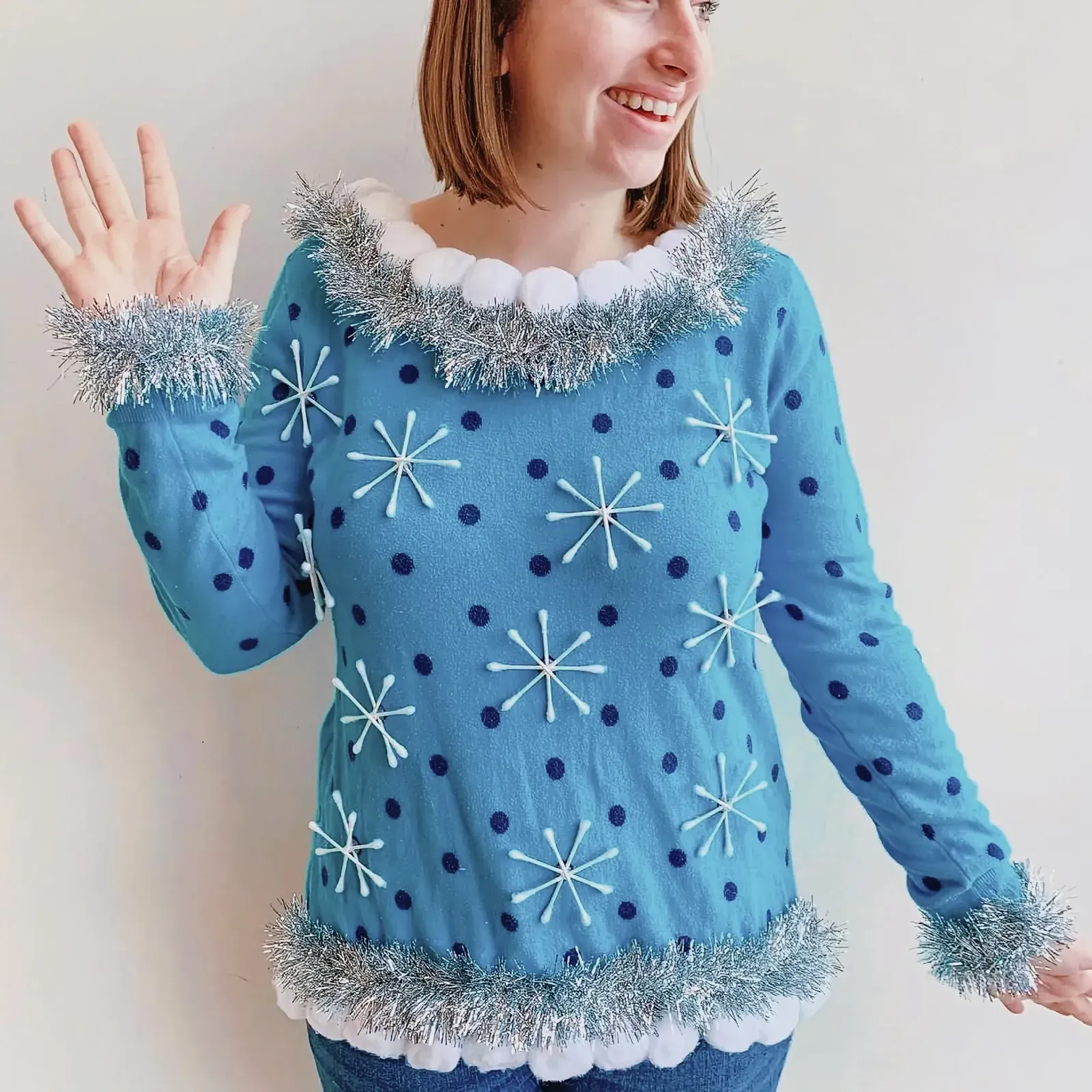 Crafting a unique ugly Christmas sweater with Swisspers cotton products.