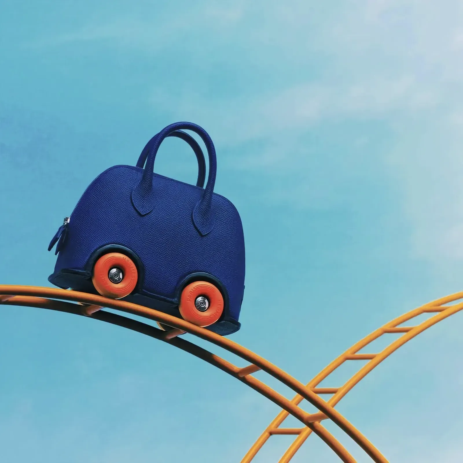 Vibrant scene featuring a blue bag on a roller coaster