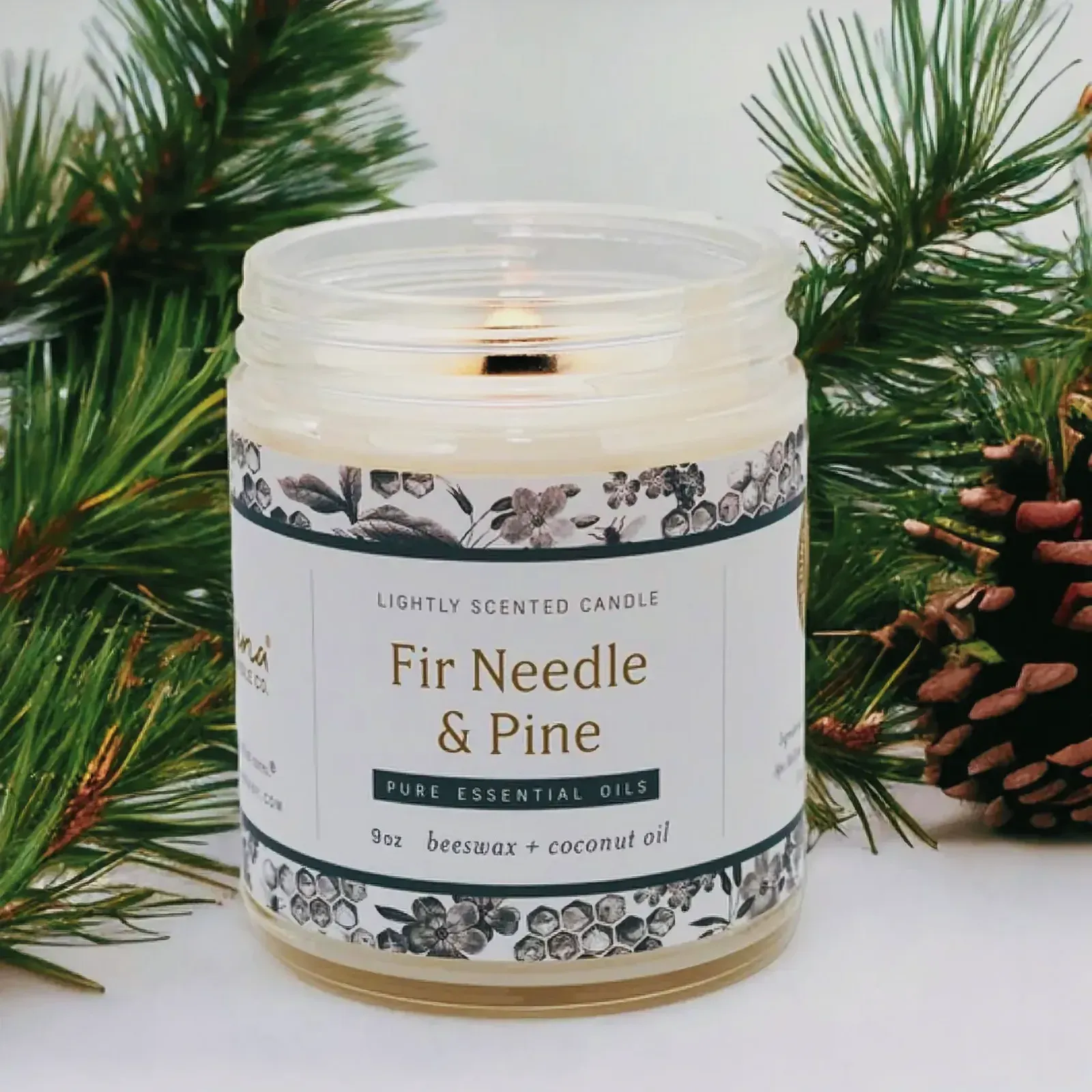 Tranquil Christmas candle with pine branches