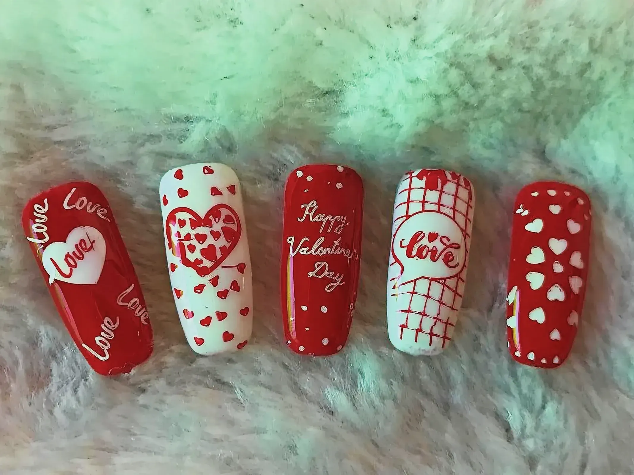 Arrangement of items for Valentine's Day nail art