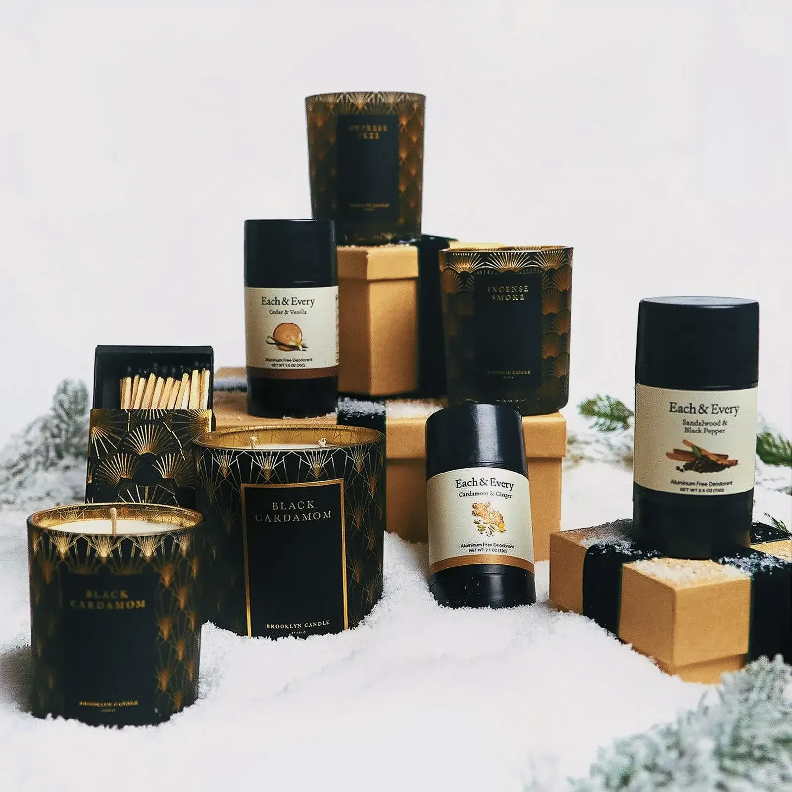 Festive black and gold candles creating a luxurious atmosphere